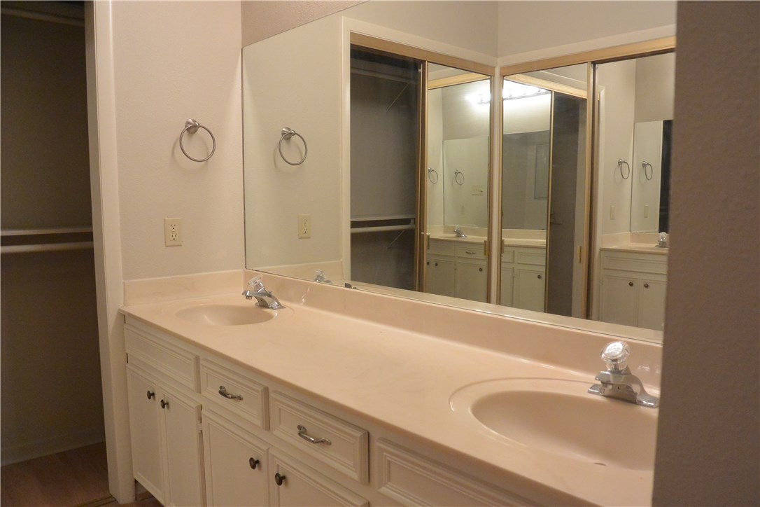 4902 Smokey Valley, Unit A Austin, TX 78731 - Photo 10 of 19 Master bedroom has dual vanities.