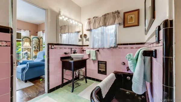 a bedroom with a bed and a closet