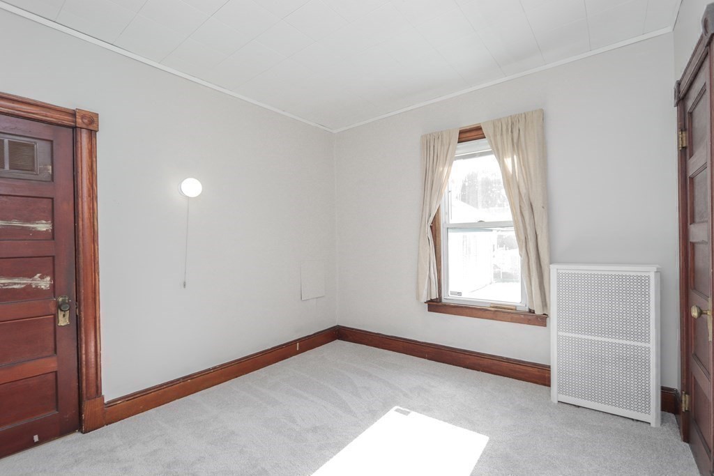46 Osborne Terrace Springfield, MA 01104 - Photo 17 of 42 an empty room with windows