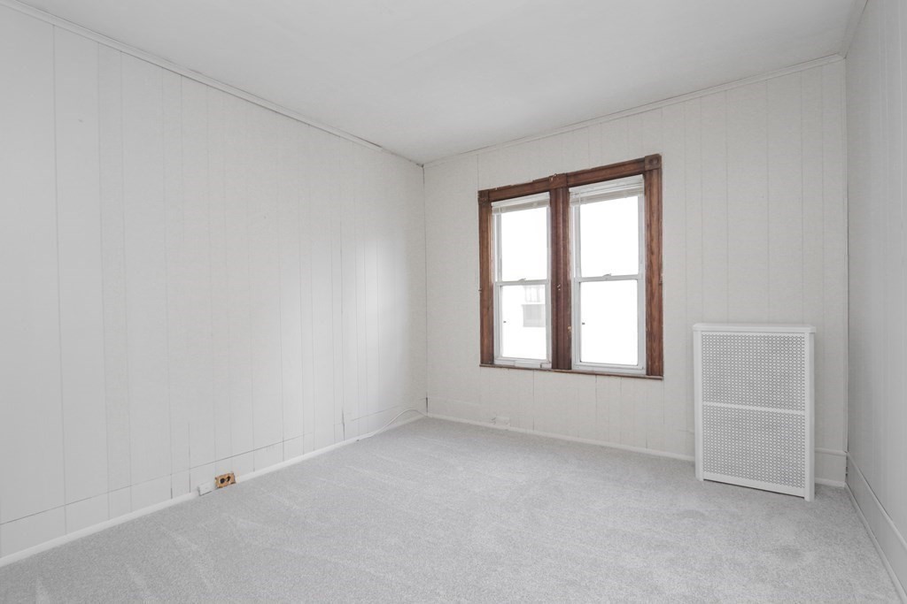46 Osborne Terrace Springfield, MA 01104 - Photo 19 of 42 an empty room with a window