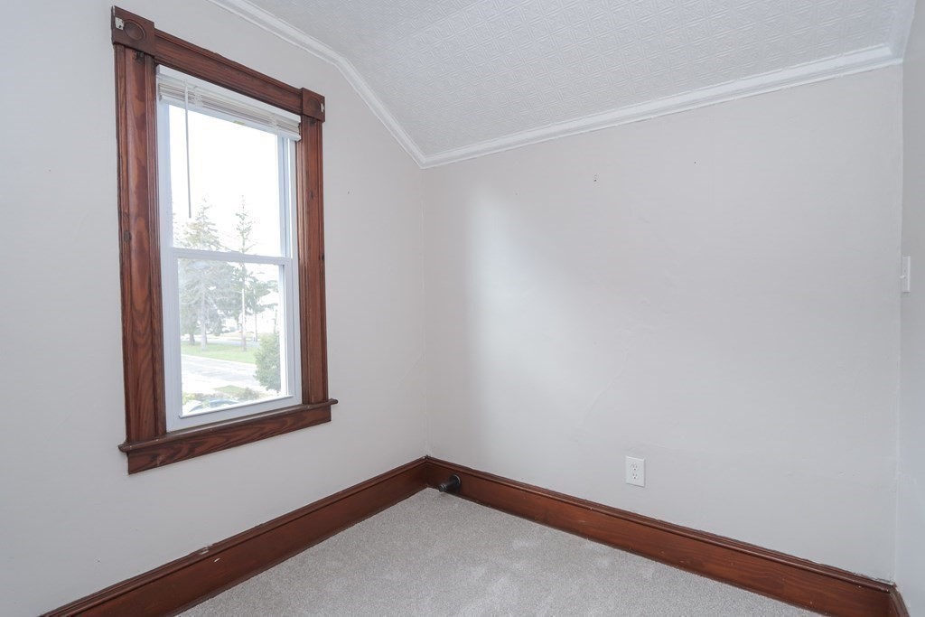 46 Osborne Terrace Springfield, MA 01104 - Photo 35 of 42 a view of an empty room with a window