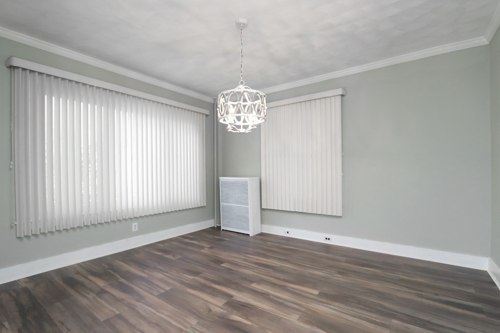 46 Osborne Terrace Springfield, MA 01104 - Photo 7 of 42 a view of a room with wooden floor and chandelier