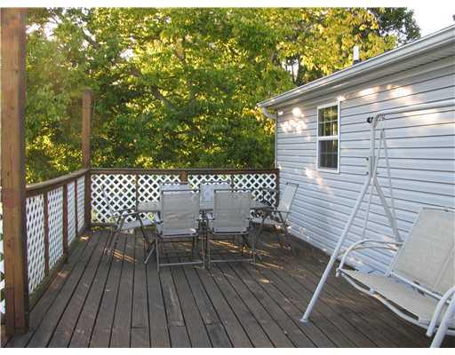 686 Venetia Road Venetia, PA 15367 - Photo 17 of 18 Exterior Back. view of the deck off the kitchen