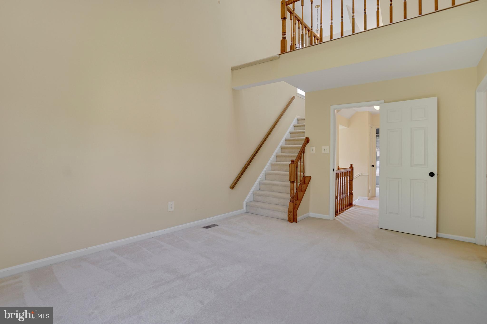 8890 Eagle Rock Lane Springfield, VA 22153 - Photo 16 of 39 Vaulted ceilings with stairs to loft