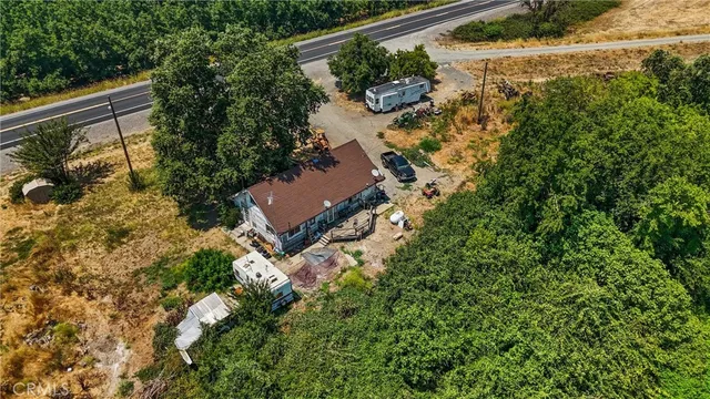 a view of a small garden in a backyard