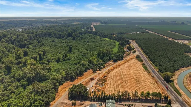 a view of a yard with an outdoor seating