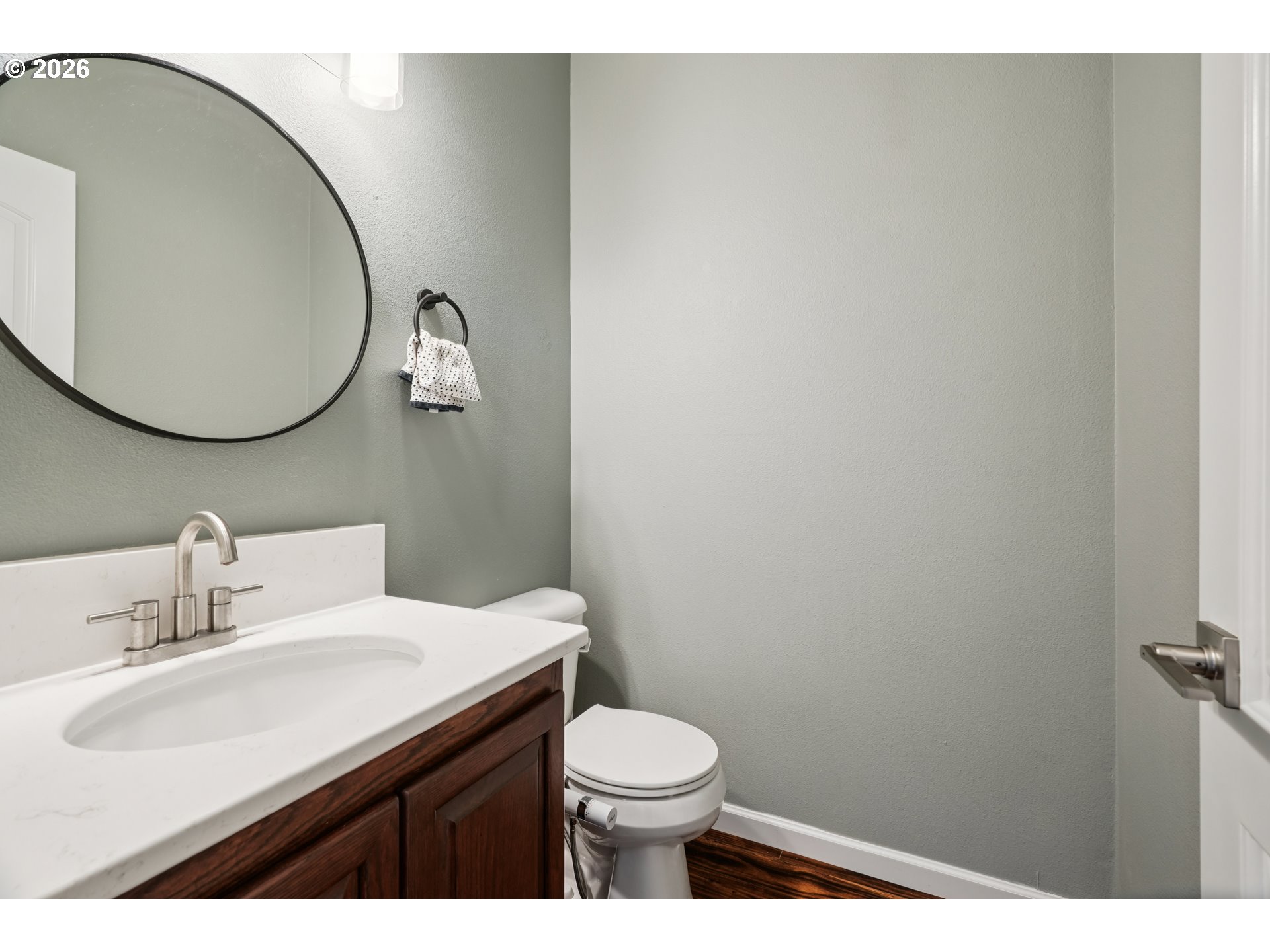4818 Southwest 2nd Court Portland, OR 97239 - Photo 11 of 26 a bathroom with a sink mirror and toilet