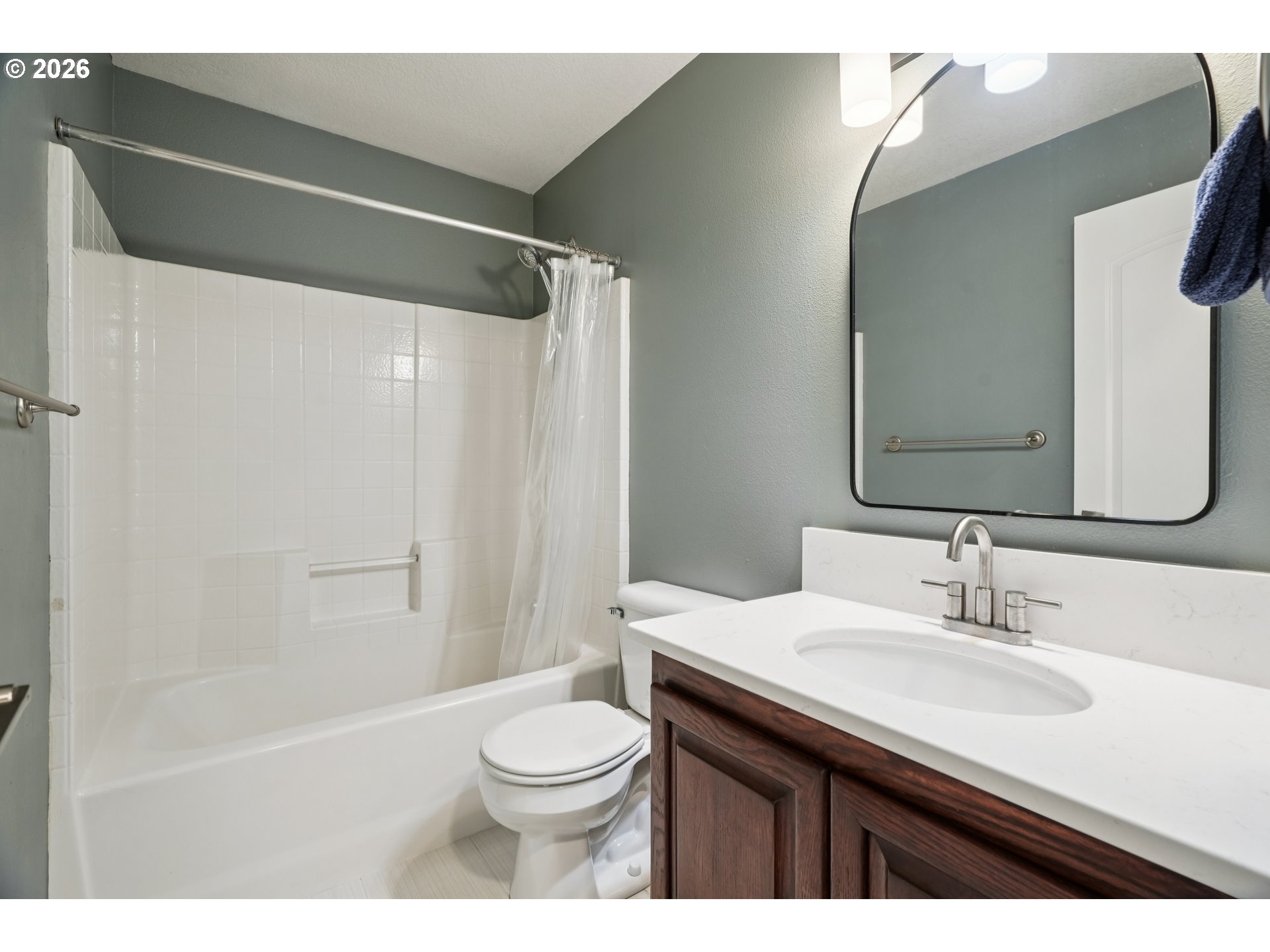 4818 Southwest 2nd Court Portland, OR 97239 - Photo 20 of 26 a bathroom with a sink a toilet and shower