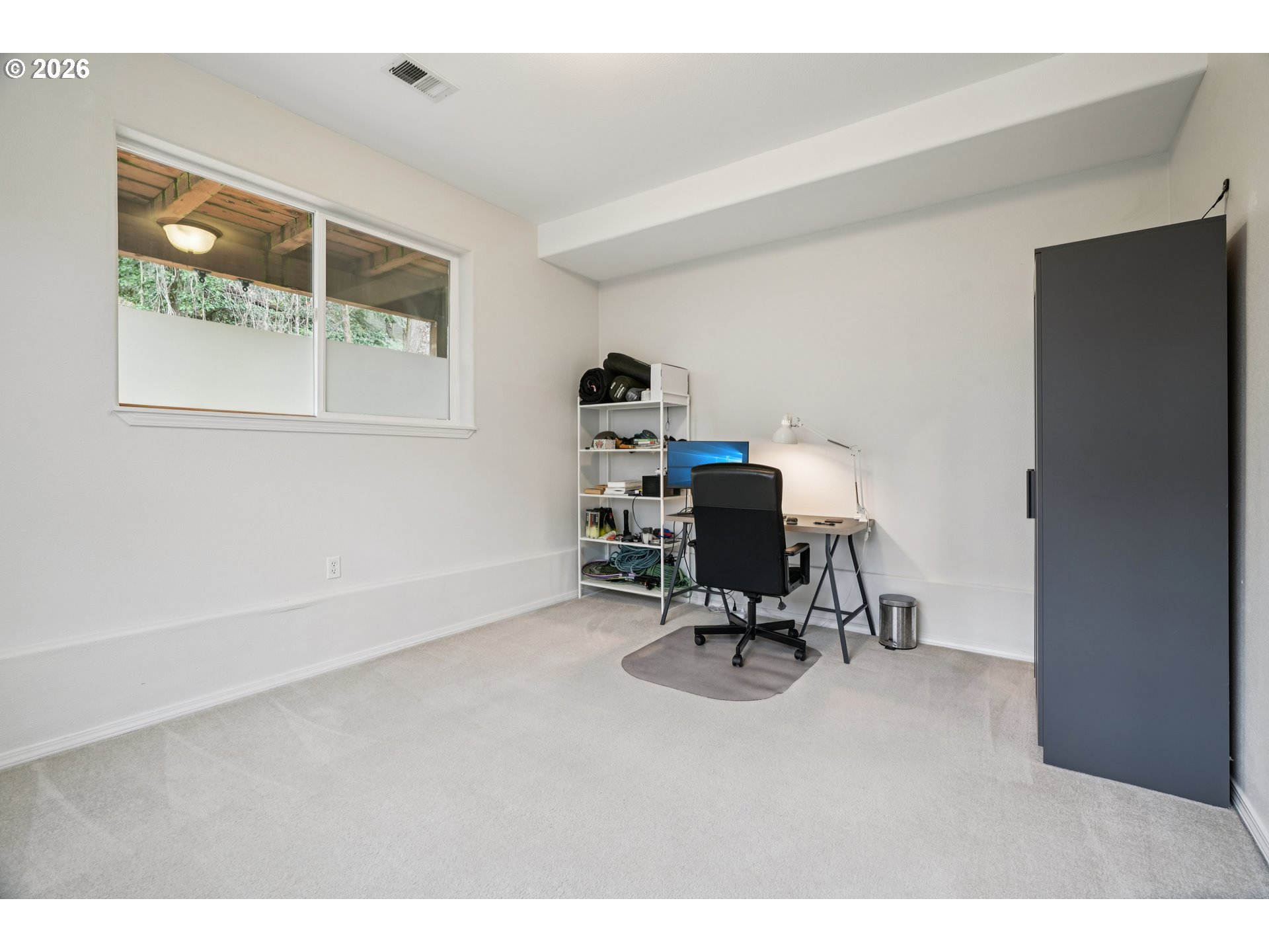 4818 Southwest 2nd Court Portland, OR 97239 - Photo 21 of 26 a view of a workspace with furniture
