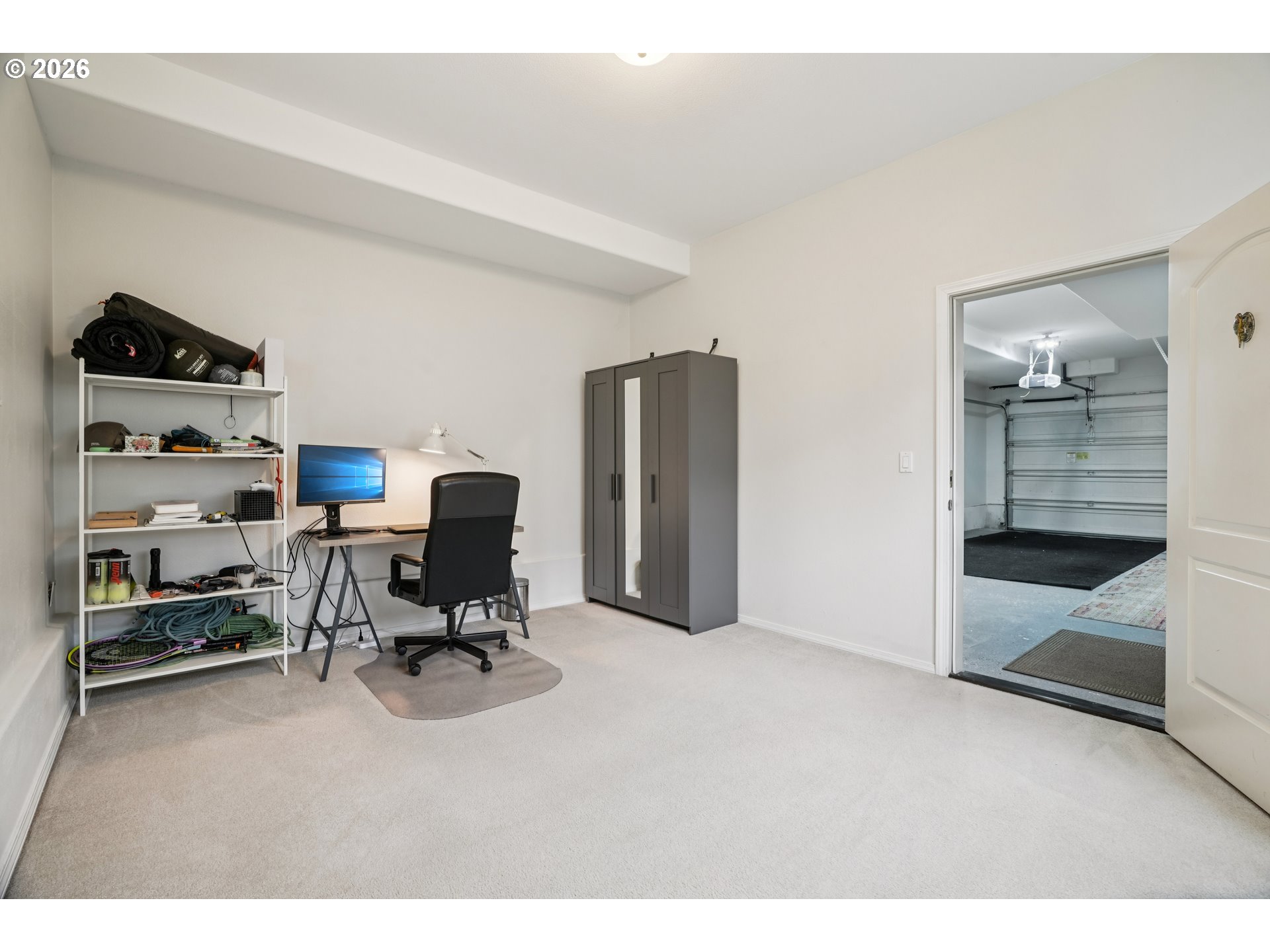 4818 Southwest 2nd Court Portland, OR 97239 - Photo 22 of 26 a workspace with furniture and natural light