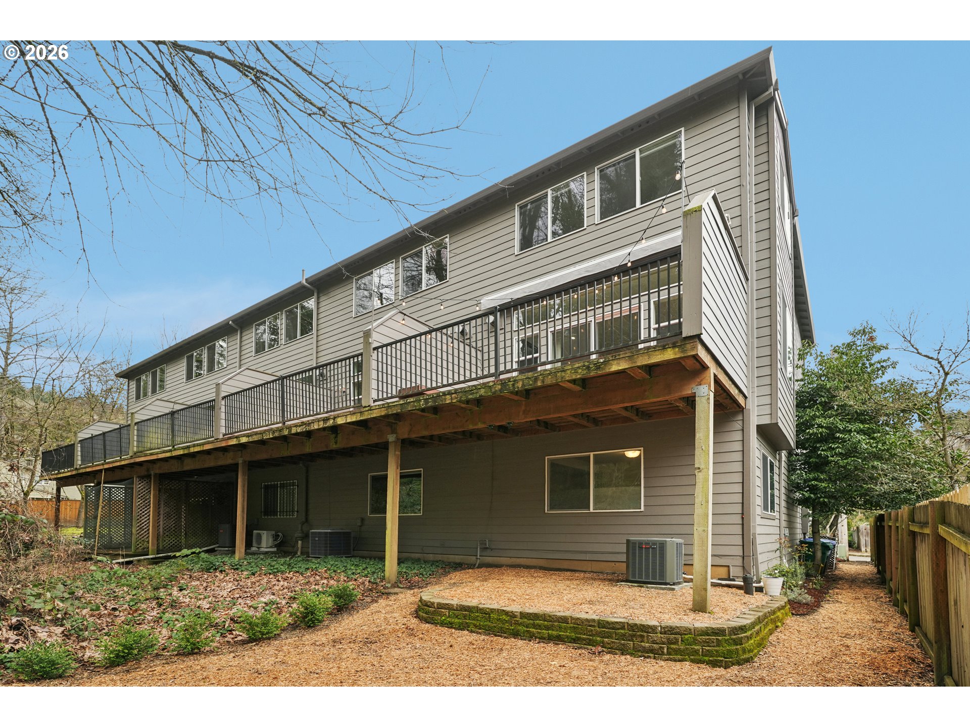 4818 Southwest 2nd Court Portland, OR 97239 - Photo 24 of 26 a front view of a house with yard