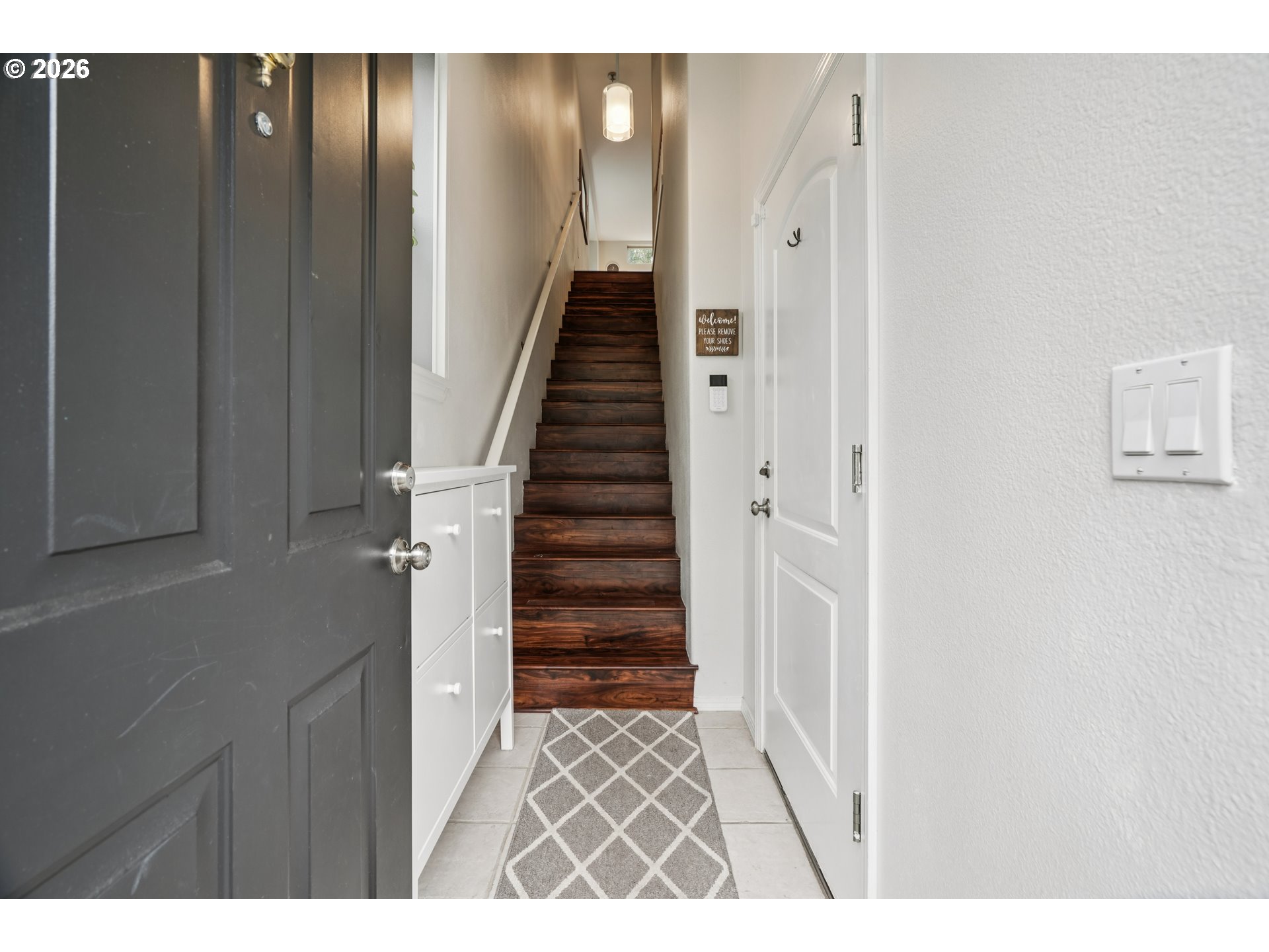 4818 Southwest 2nd Court Portland, OR 97239 - Photo 3 of 26 a view of entryway with wooden floor