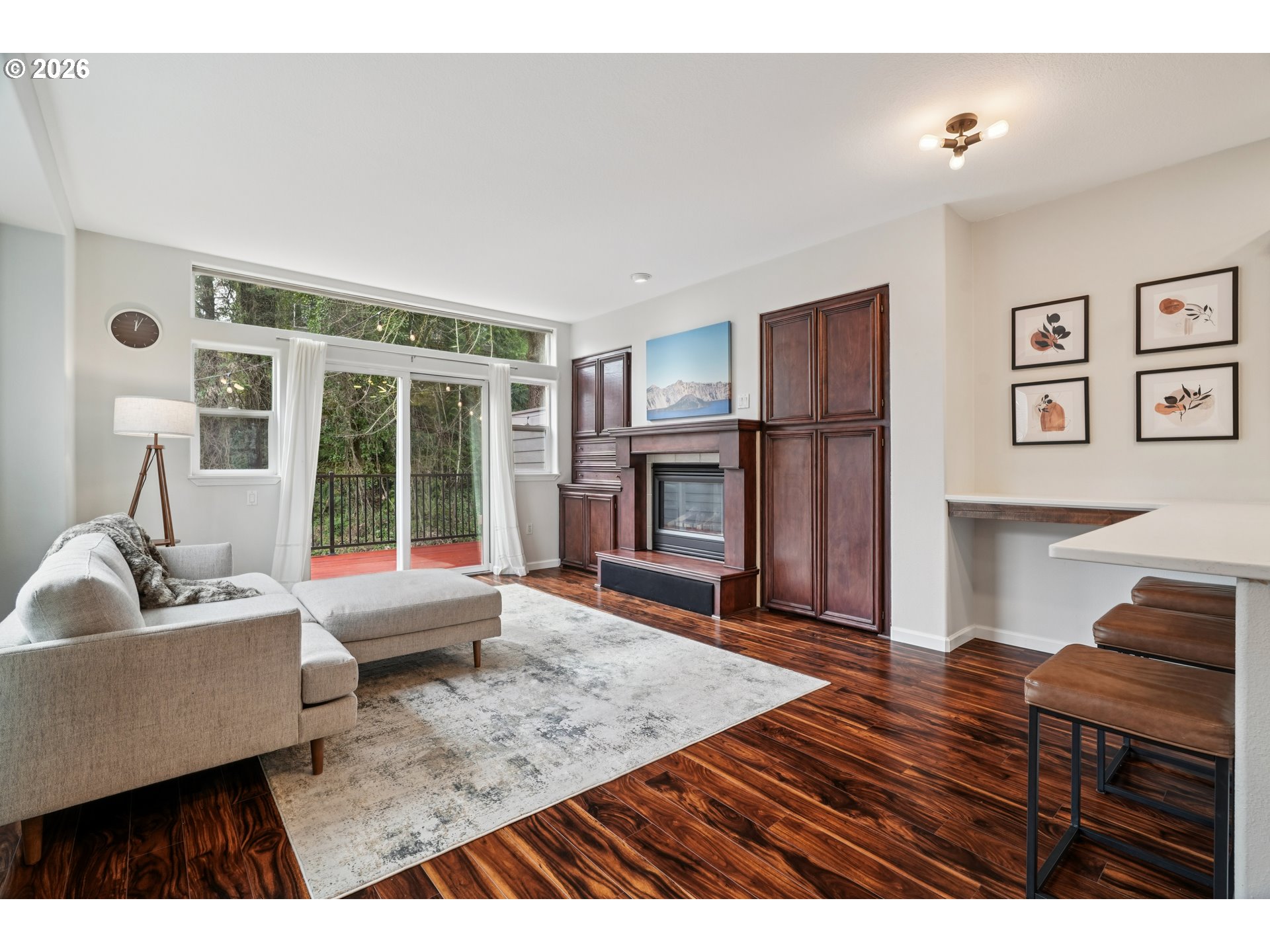 4818 Southwest 2nd Court Portland, OR 97239 - Photo 4 of 26 a living room with furniture and a flat screen tv