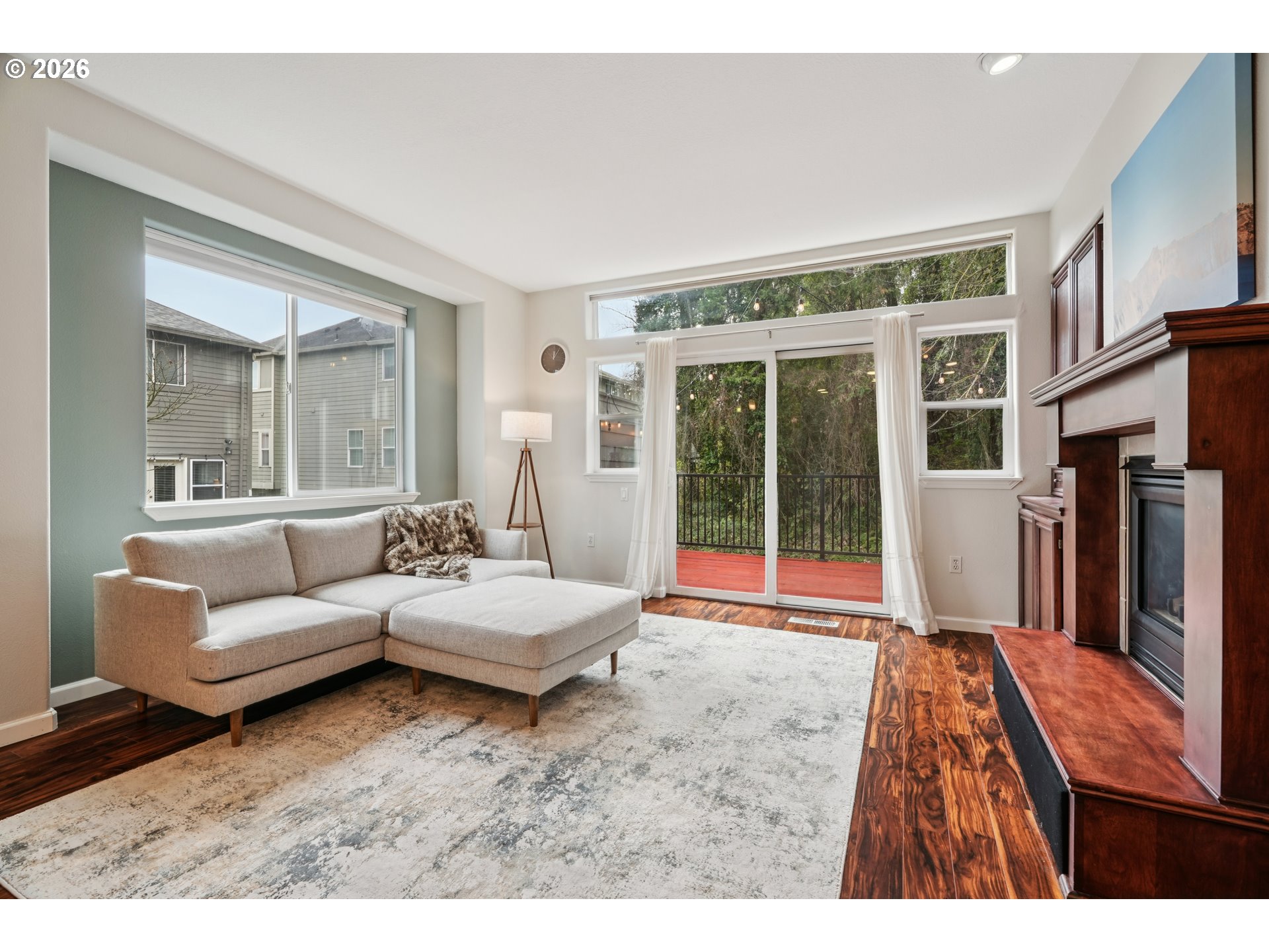4818 Southwest 2nd Court Portland, OR 97239 - Photo 5 of 26 a living room with furniture and a large window