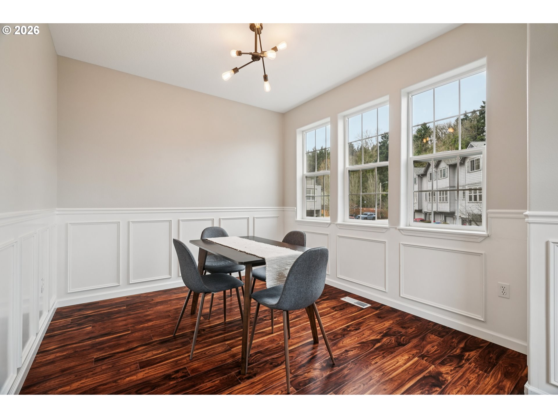 4818 Southwest 2nd Court Portland, OR 97239 - Photo 7 of 26 a view of a dining room with furniture and wooden floor