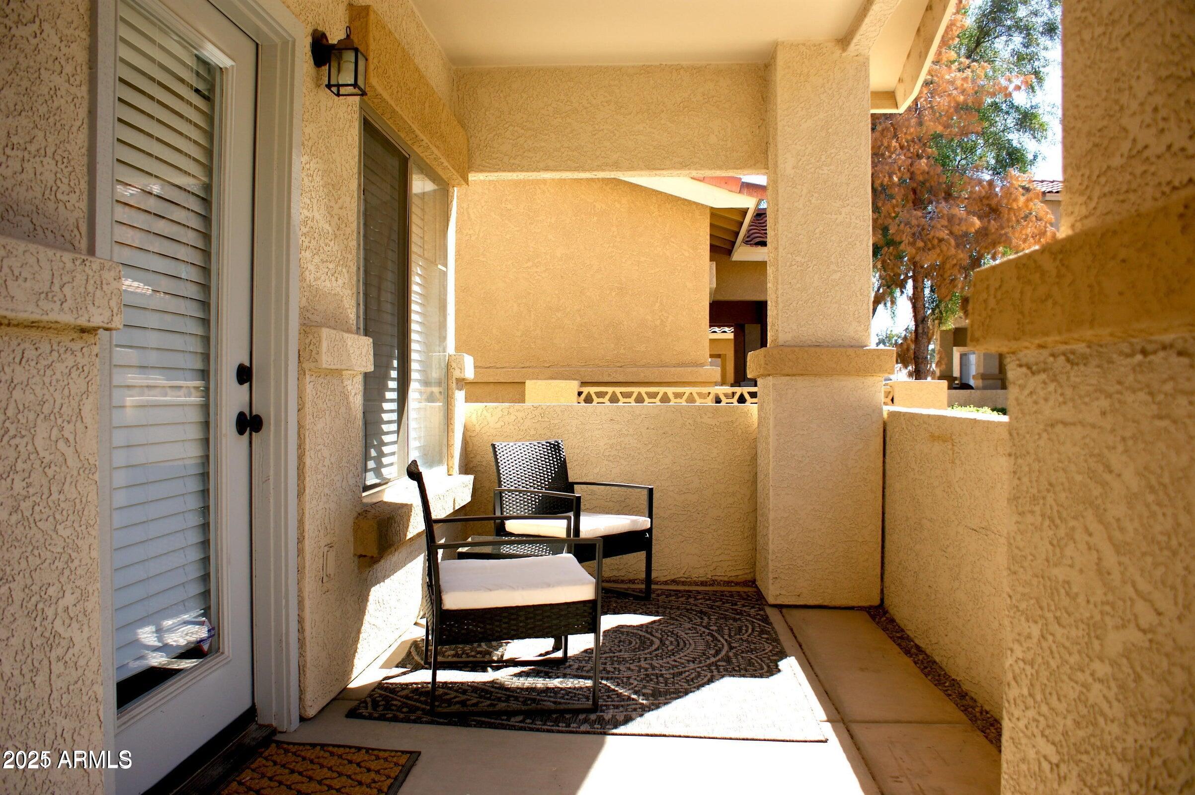 525 North Miller Road, Unit 145 Scottsdale, AZ 85257 - Photo 2 of 9 a view of balcony and patio