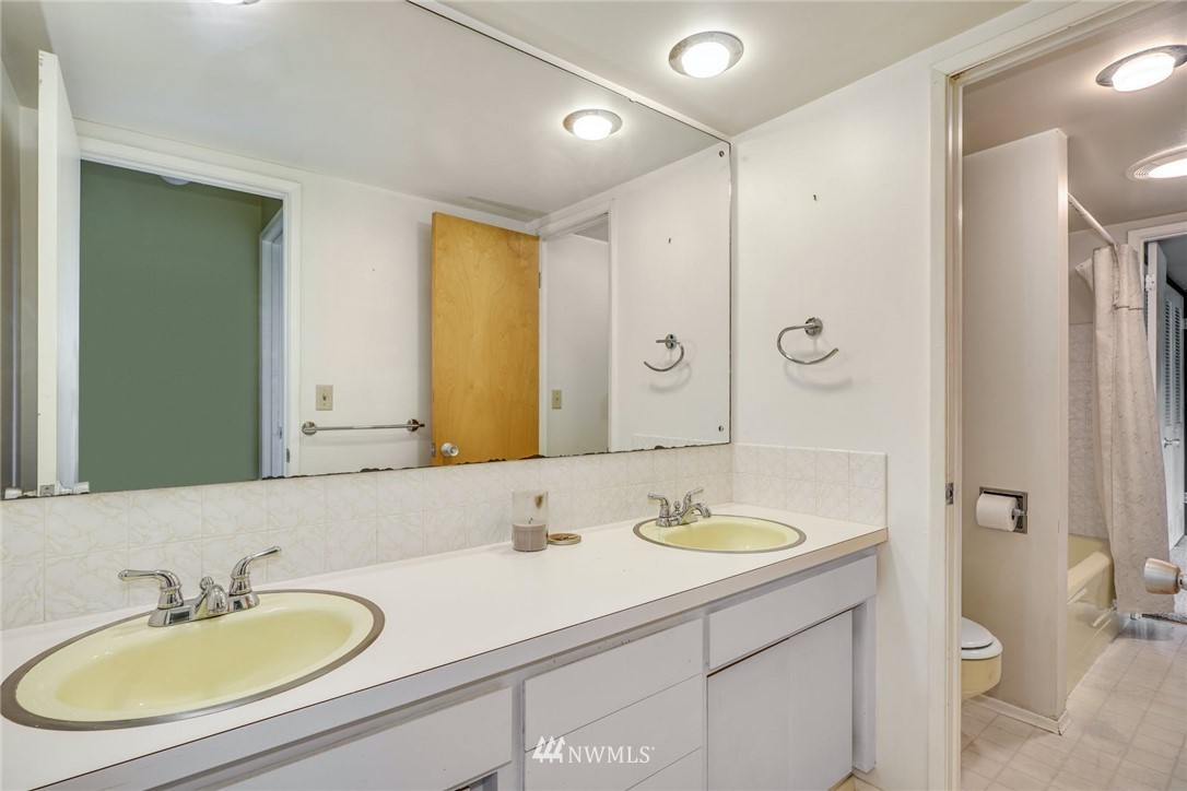 38131 Southeast 91st Street Snoqualmie, WA 98065 - Photo 25 of 40 a bathroom with a sink double vanity and a toilet