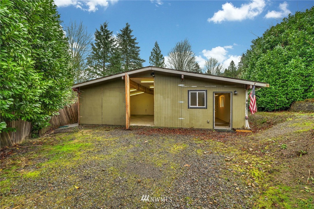 38131 Southeast 91st Street Snoqualmie, WA 98065 - Photo 28 of 40 a house with trees in the background