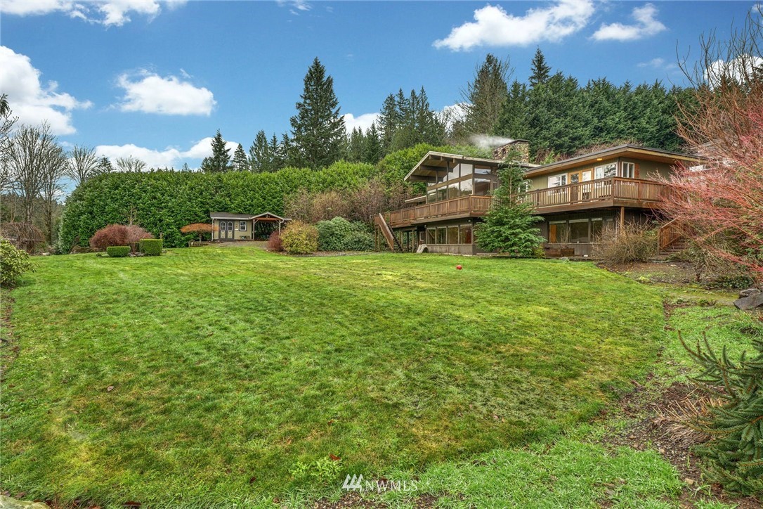 38131 Southeast 91st Street Snoqualmie, WA 98065 - Photo 33 of 40 a front view of a house with garden