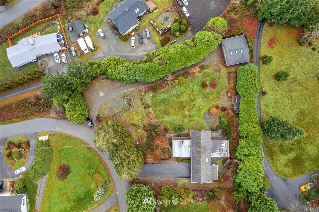 38131 Southeast 91st Street Snoqualmie, WA 98065 - Photo 40 of 40 an aerial view of a house with outdoor space swimming pool and tennis court