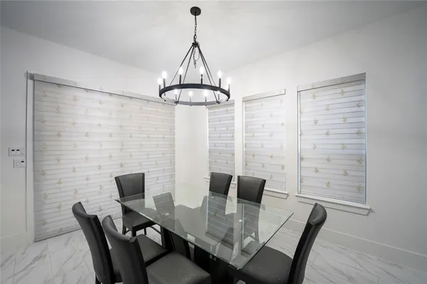 a view of a dining room with furniture