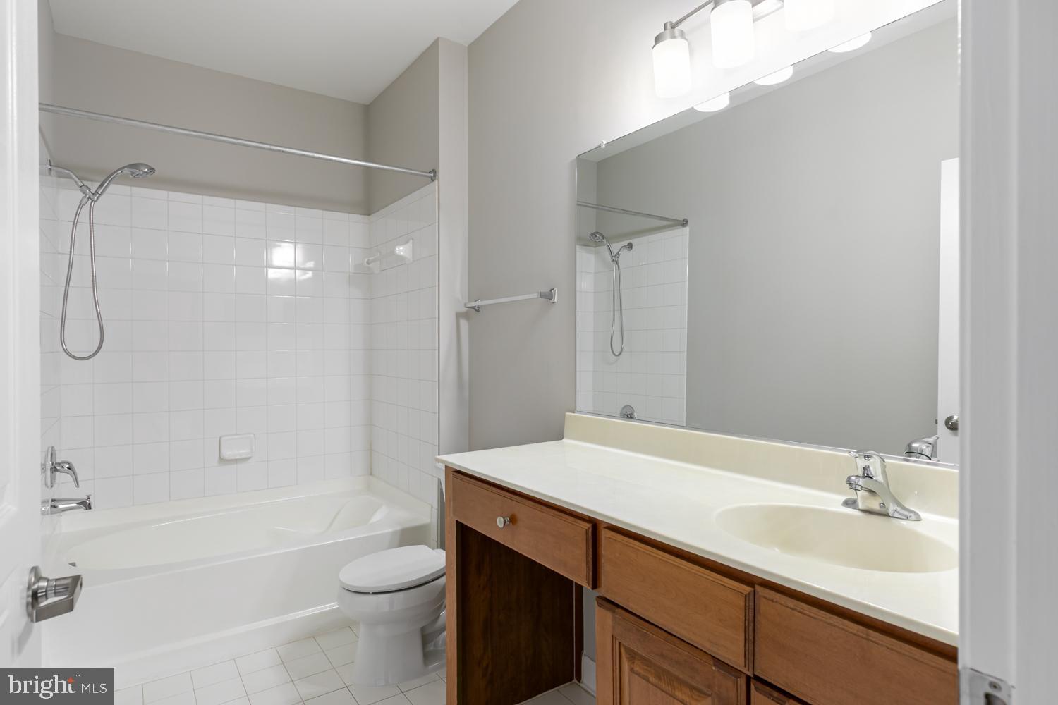 12001 Market Street, Unit 217 Reston, VA 20190 - Photo 12 of 38 Primary Bathroom