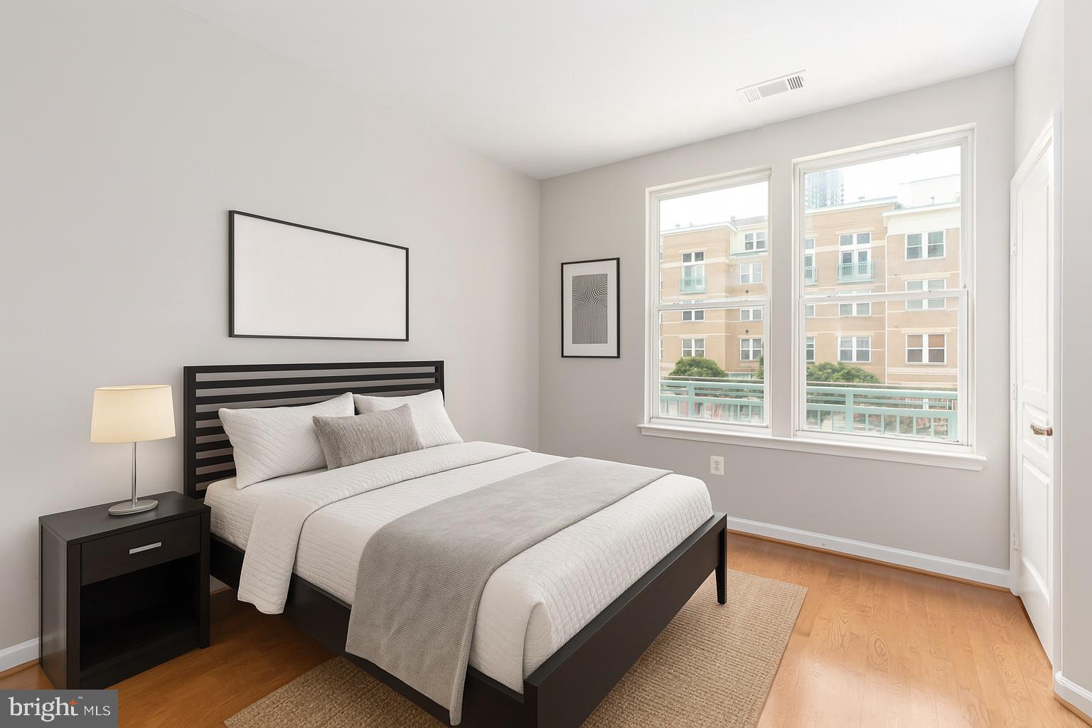 12001 Market Street, Unit 217 Reston, VA 20190 - Photo 16 of 38 Secondary Bedroom Virtually Staged