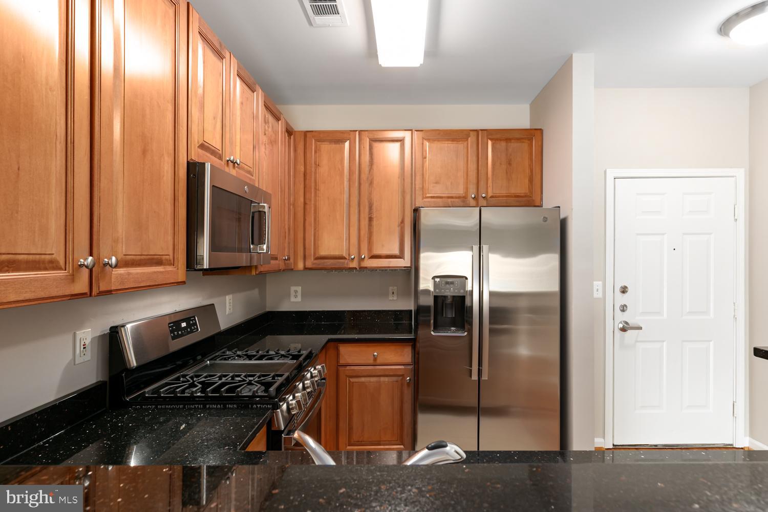 12001 Market Street, Unit 217 Reston, VA 20190 - Photo 3 of 38 Kitchen View 2