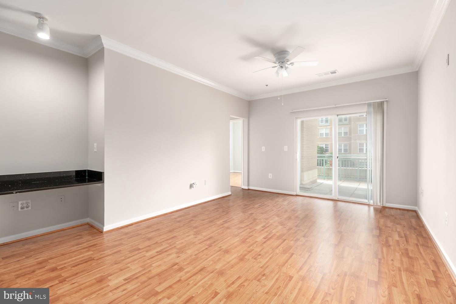 12001 Market Street, Unit 217 Reston, VA 20190 - Photo 6 of 38 Living Rm View 2 w/work area
