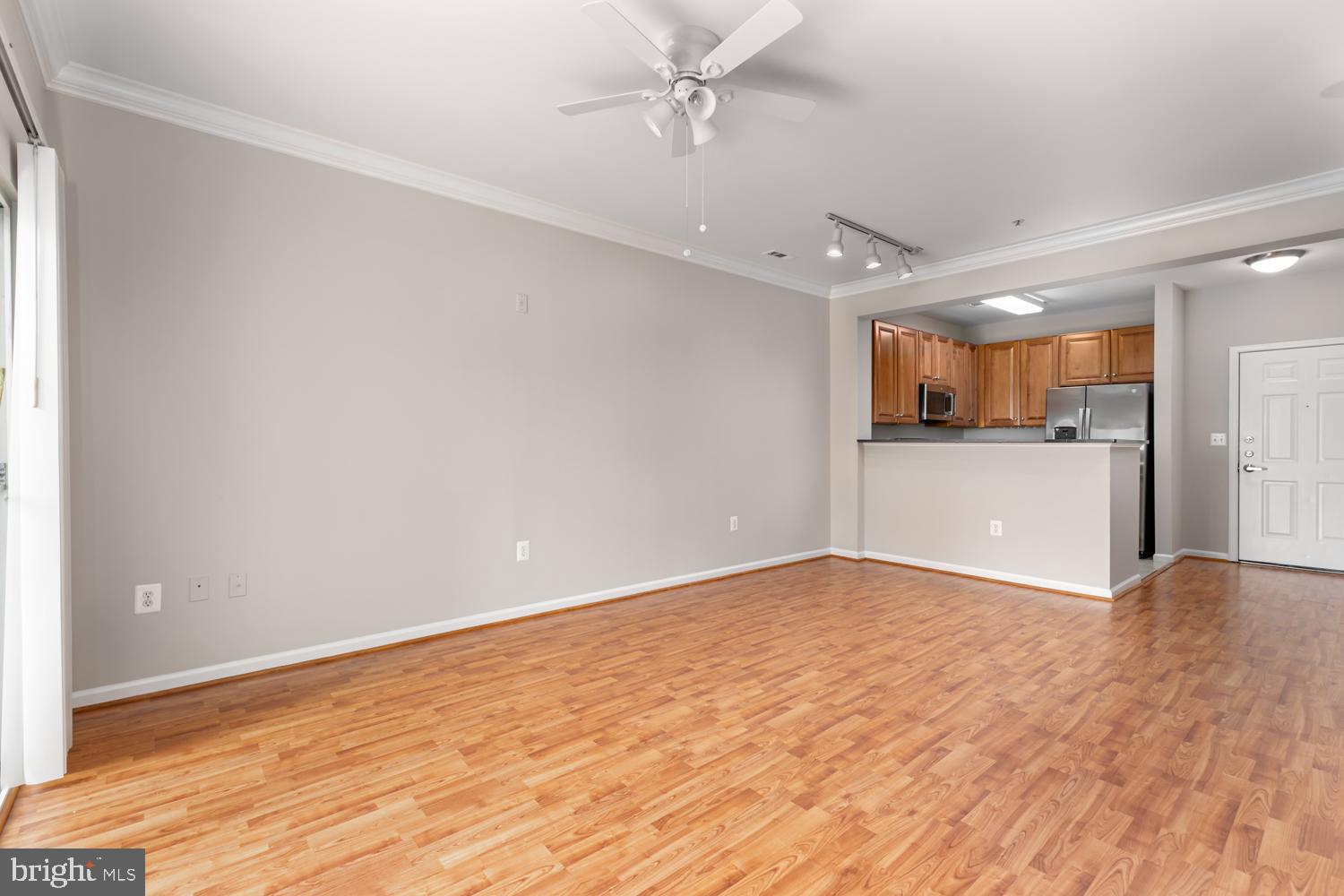 12001 Market Street, Unit 217 Reston, VA 20190 - Photo 8 of 38 Living Rm View 4