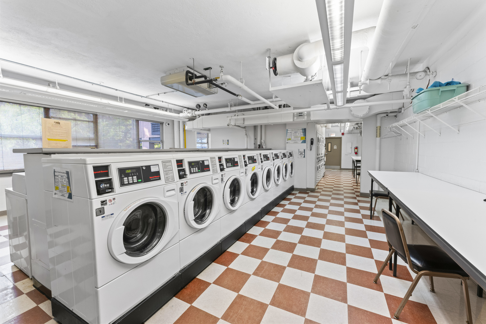 6301 North Sheridan Road, Unit 11R Chicago, IL 60660 - Photo 16 of 17 a utility room with dryer and washer