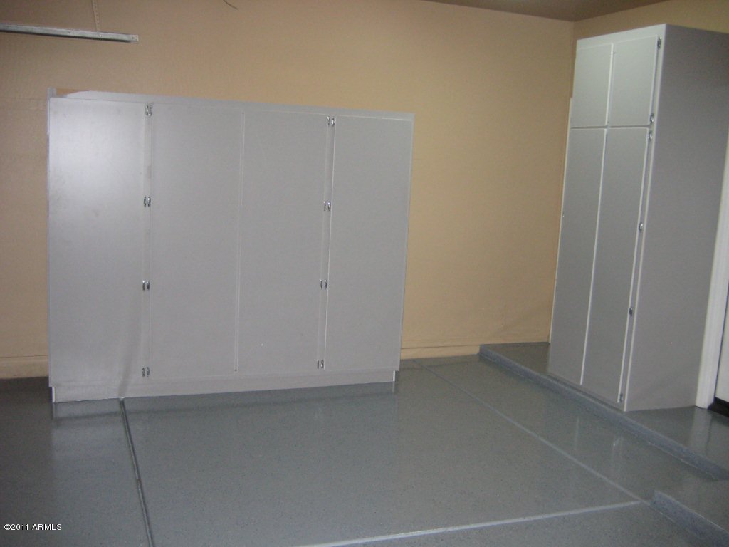 4722 East Hearn Road Phoenix, AZ 85032 - Photo 21 of 23 GARAGE CABINETS WITH EPOXY FLOORING