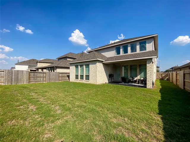 a view of a house with a garden