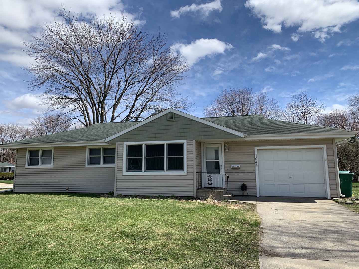 1044 Park Avenue Sycamore, IL 60178 - Photo 1 of 23 a house with trees in the background