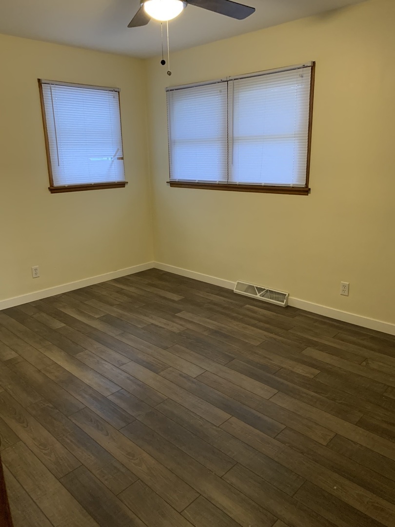 1044 Park Avenue Sycamore, IL 60178 - Photo 19 of 23 a view of room and wooden floor