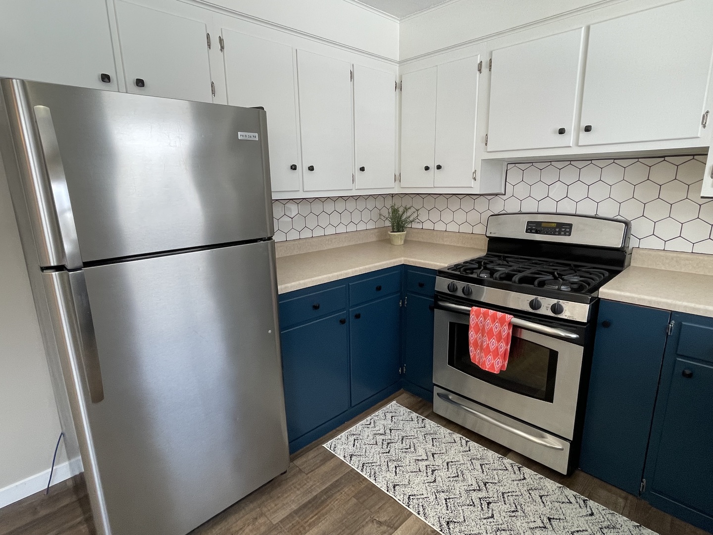 1044 Park Avenue Sycamore, IL 60178 - Photo 9 of 23 a kitchen with refrigerator and cabinets