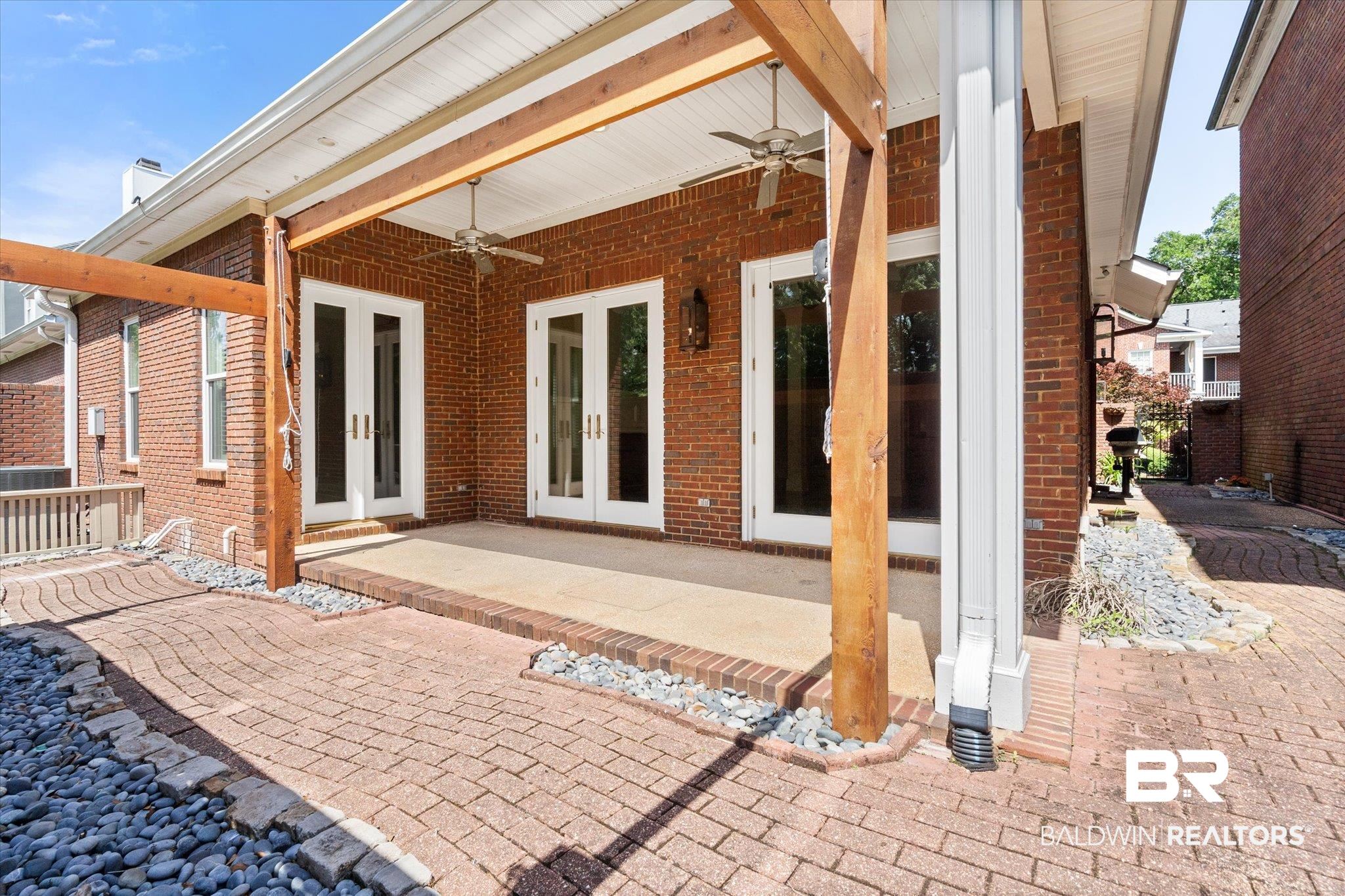 107 Fielding Place Mobile, AL 36608 - Photo 21 of 27 View of patio with french doors, a ceiling fan, and central AC unit