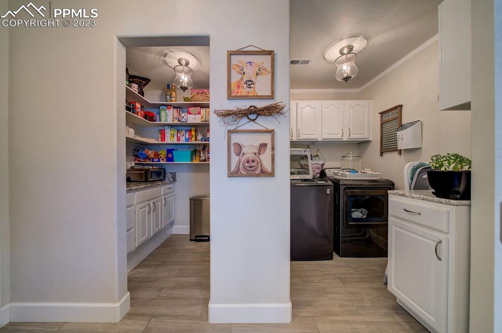 648 South McCulloch Boulevard Pueblo, CO 81007 - Photo 19 of 50 a kitchen with stainless steel appliances granite countertop a refrigerator and a stove top oven