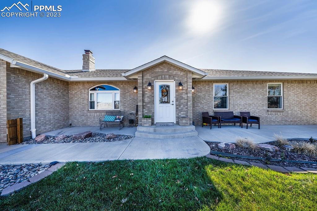 648 South McCulloch Boulevard Pueblo, CO 81007 - Photo 2 of 50 a view of a house with a patio