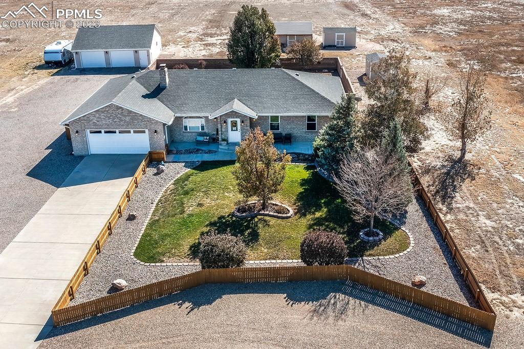 648 South McCulloch Boulevard Pueblo, CO 81007 - Photo 3 of 50 a view of house with a swimming pool