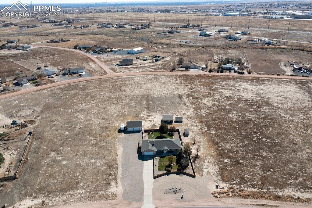 648 South McCulloch Boulevard Pueblo, CO 81007 - Photo 39 of 50 an aerial view of residential houses with outdoor space