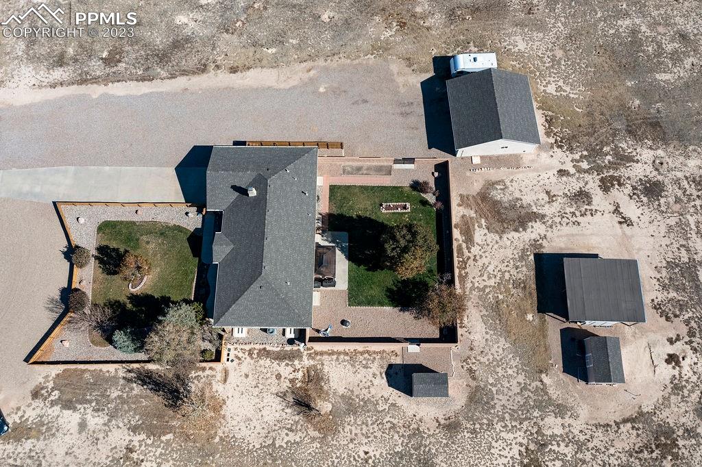 648 South McCulloch Boulevard Pueblo, CO 81007 - Photo 41 of 50 an aerial view of houses with outdoor space