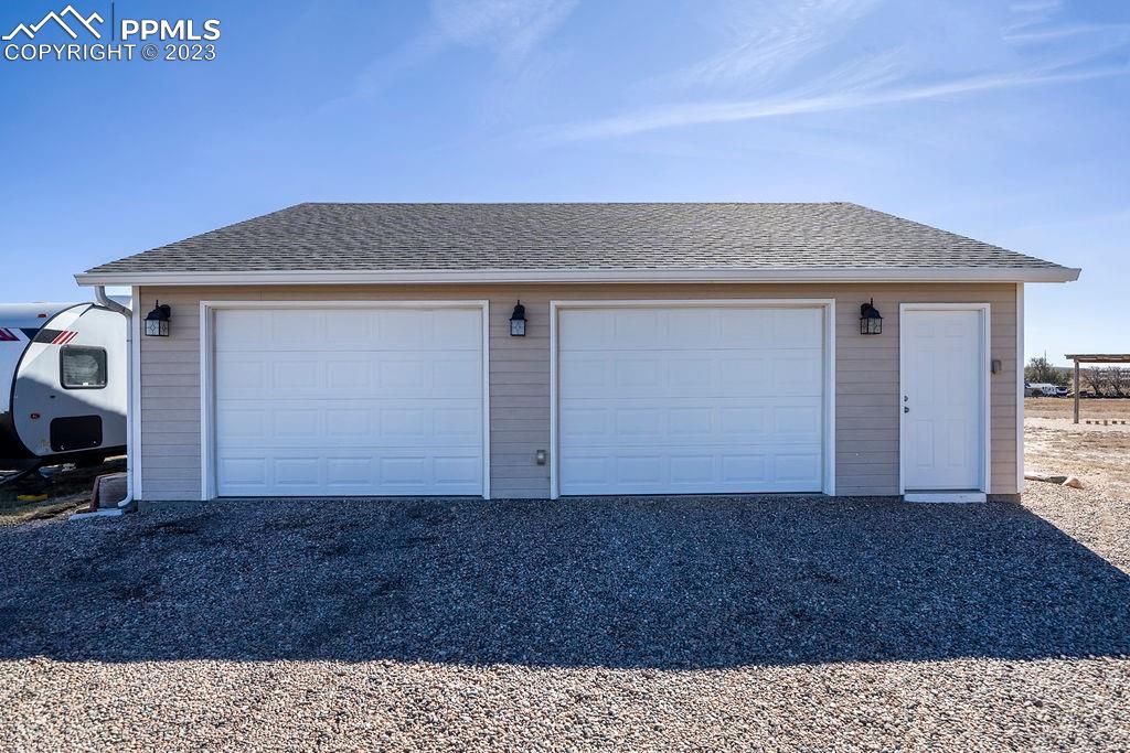 648 South McCulloch Boulevard Pueblo, CO 81007 - Photo 48 of 50 a view of a house with a yard