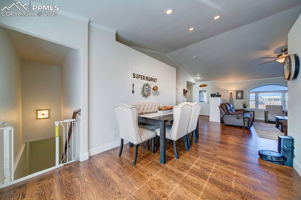 648 South McCulloch Boulevard Pueblo, CO 81007 - Photo 10 of 50 a dining room with furniture and wooden floor