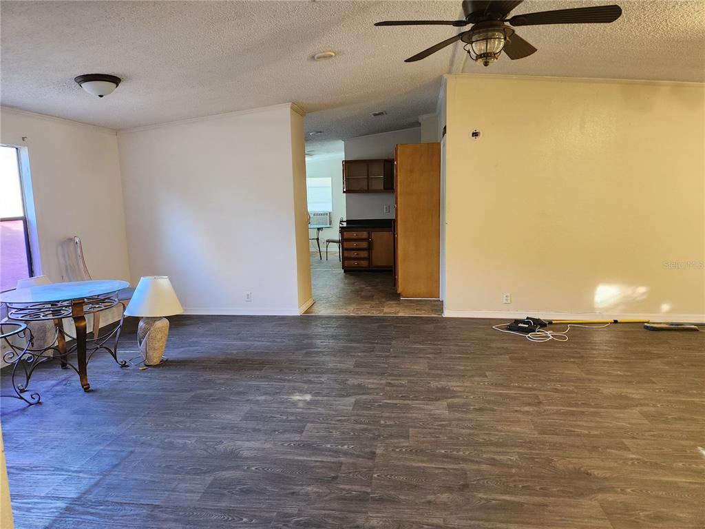 2608 20 Mile Level Road Land O' Lakes, FL 34639 - Photo 13 of 19 a view of a workspace room and hardwood floor