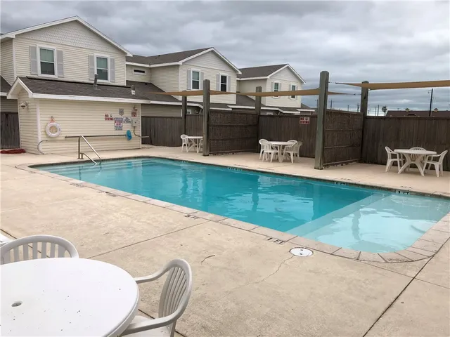 a view of a house with a swimming pool