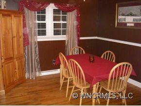 139 Crestview Street Rutherfordton, NC 28139 - Photo 5 of 6 a view of a dining room with furniture and window