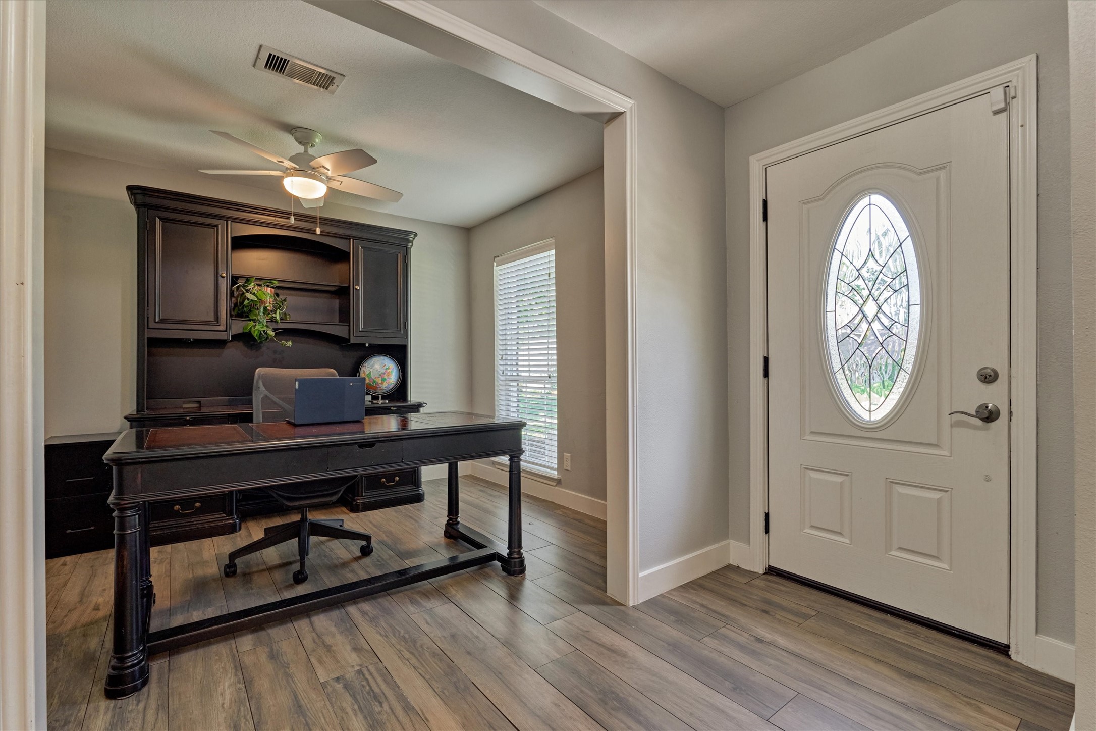 6515 Glenhill Drive Spring, TX 77389 - Photo 5 of 39 a view of a hallway with wooden floor and entryway