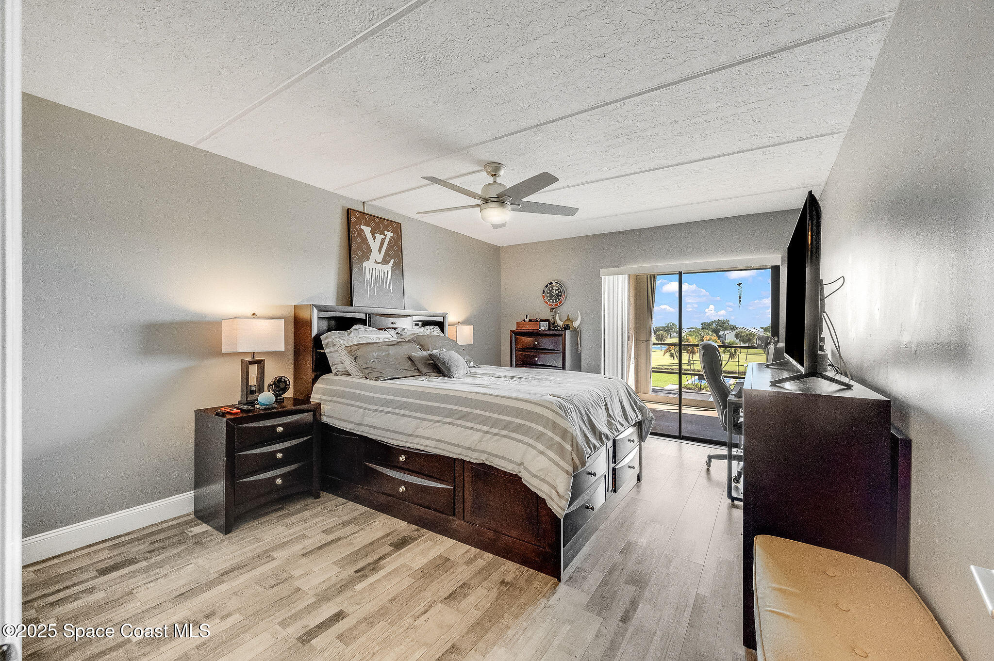 2775 North Wickham Road, Unit A302 Melbourne, FL 32935 - Photo 17 of 39 Master suite