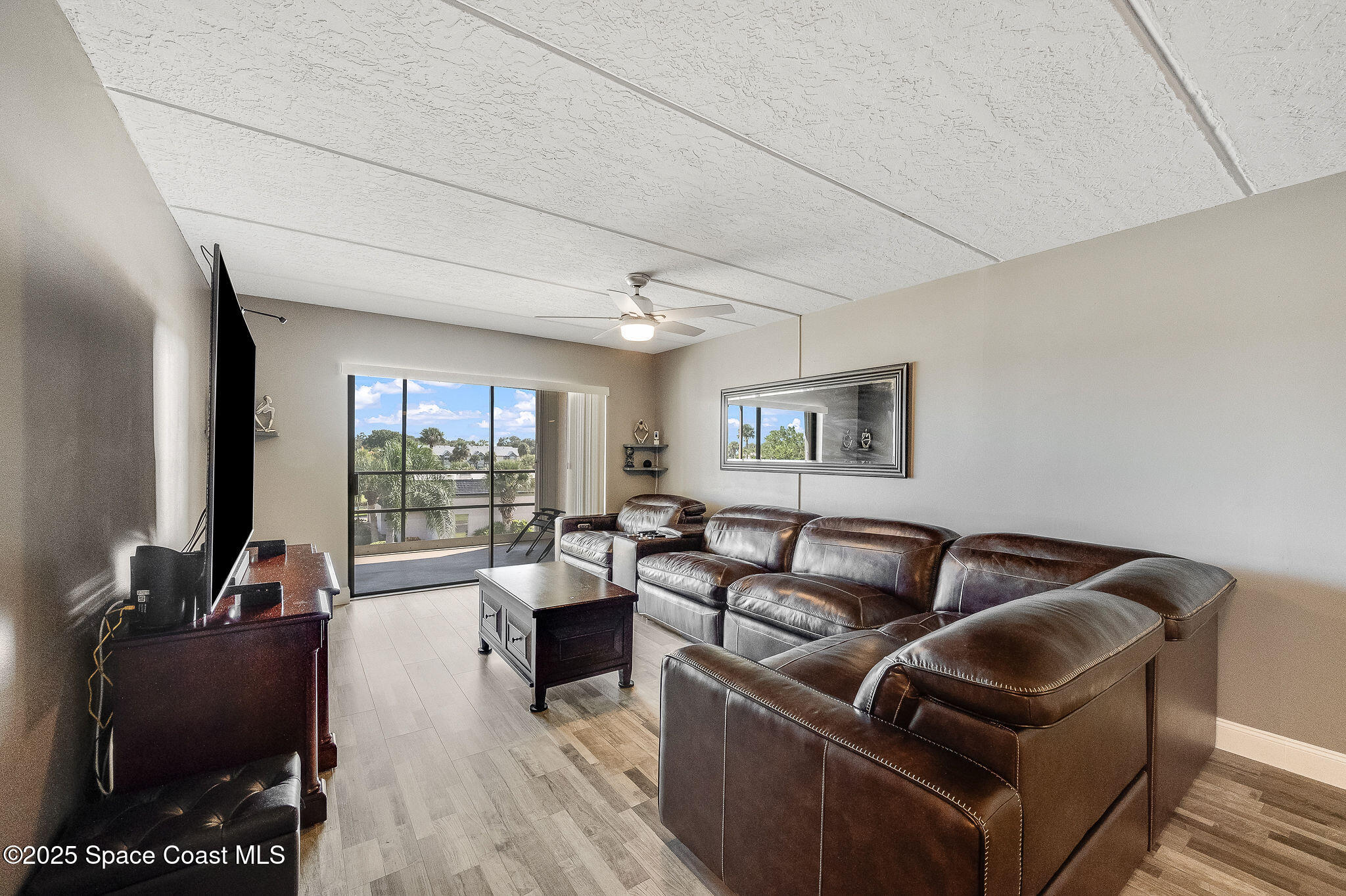 2775 North Wickham Road, Unit A302 Melbourne, FL 32935 - Photo 29 of 39 Family room